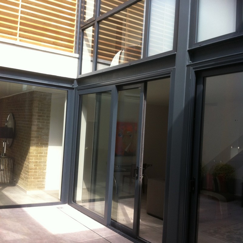 Anthracite aluminium sliding patio doors fitted in Leyton